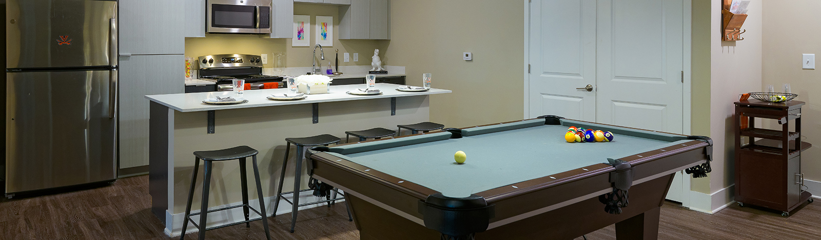 Furnished apartment featuring a pool table