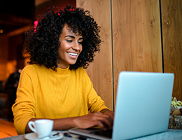 young woman studying at a coffee shop